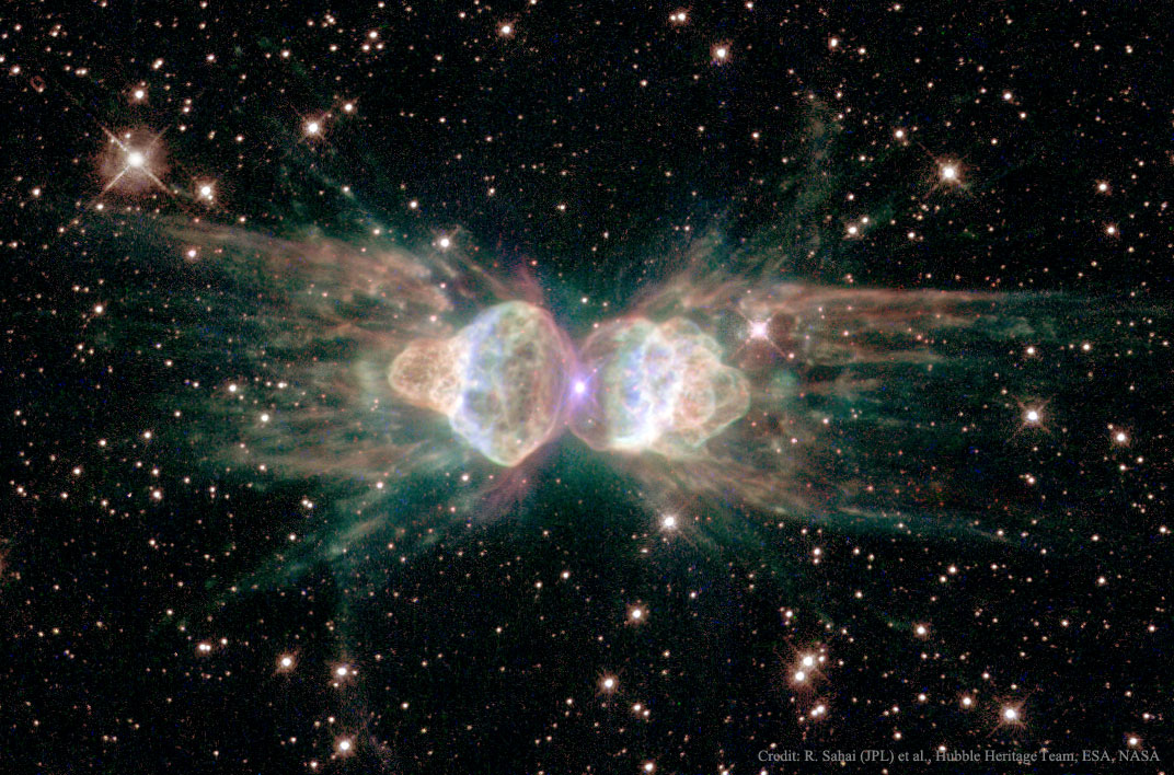 Der Nebel im Bild erinnert an eine Ameise. Das Hubble-Bild zeigt einen planetarischen Nebel im Sternbild Winkelmaß.